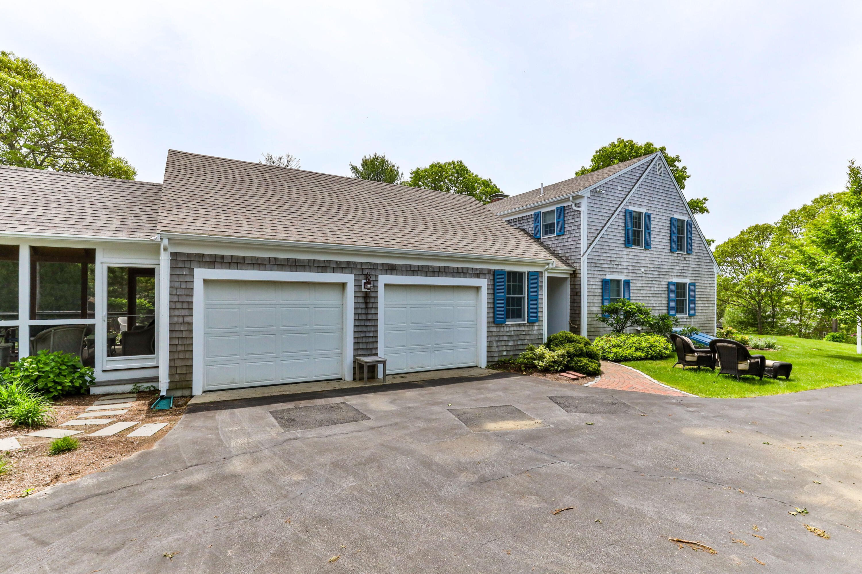 88 Round Cove Road Chatham, MA 02633 - Photo 31 of 58 front view of a house with a yard
