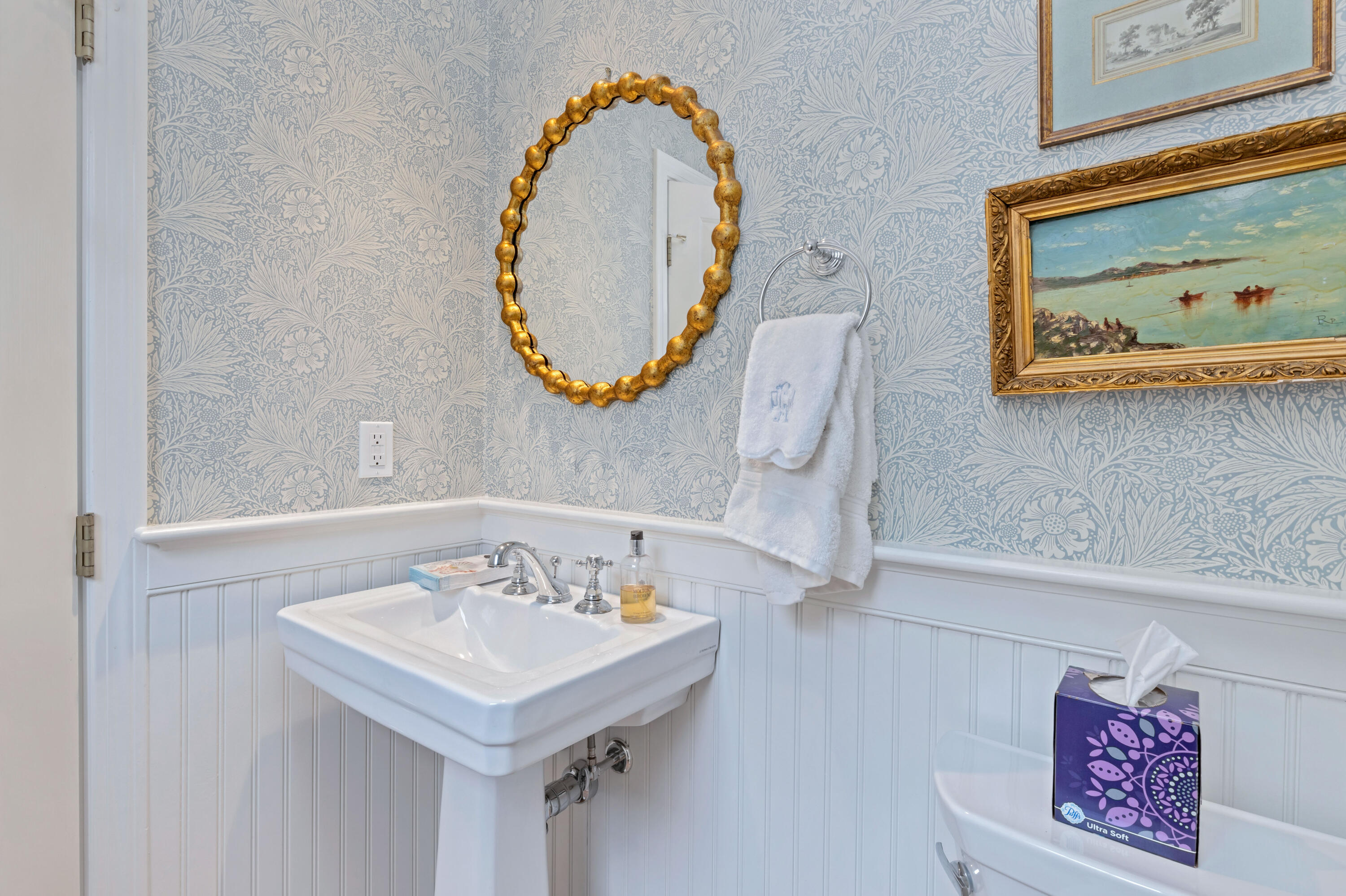 88 Round Cove Road Chatham, MA 02633 - Photo 34 of 58 a bathroom with a sink and a mirror
