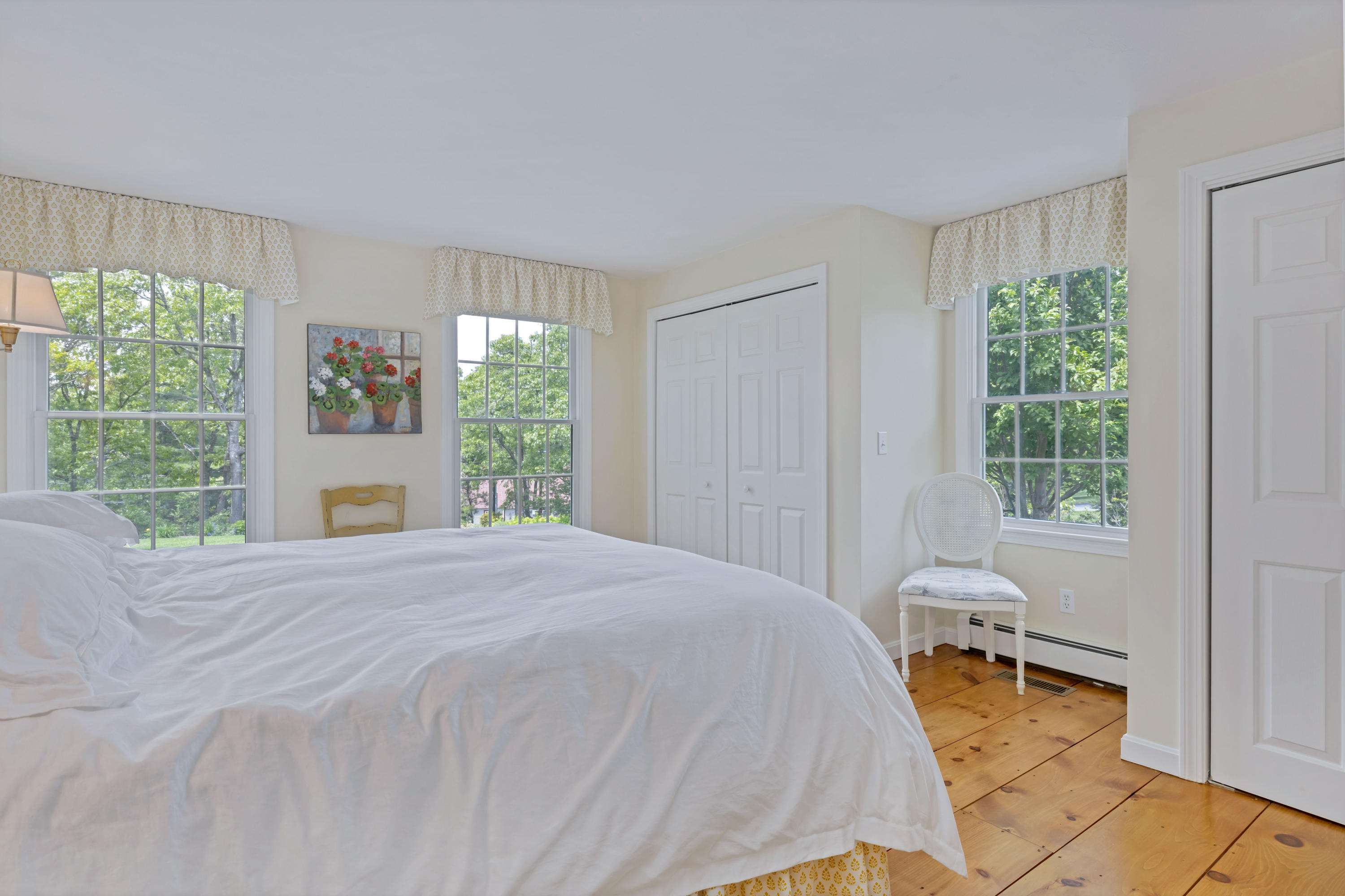 88 Round Cove Road Chatham, MA 02633 - Photo 36 of 58 a bed sitting in a spacious bedroom next to a window