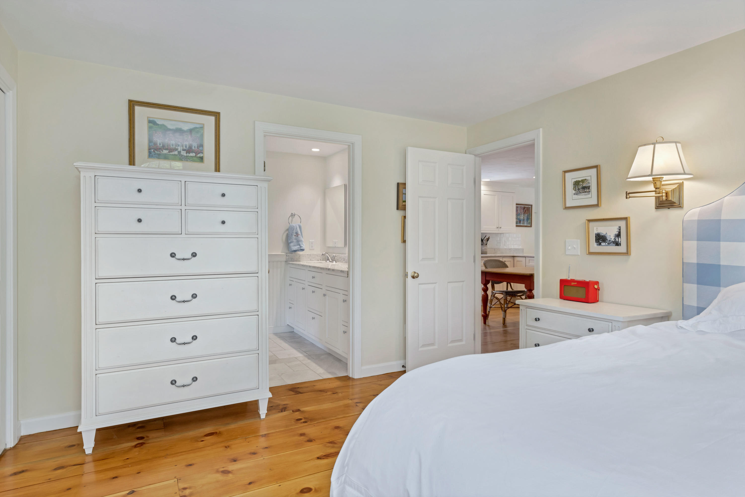 88 Round Cove Road Chatham, MA 02633 - Photo 37 of 58 a bedroom with a bed and a dresser