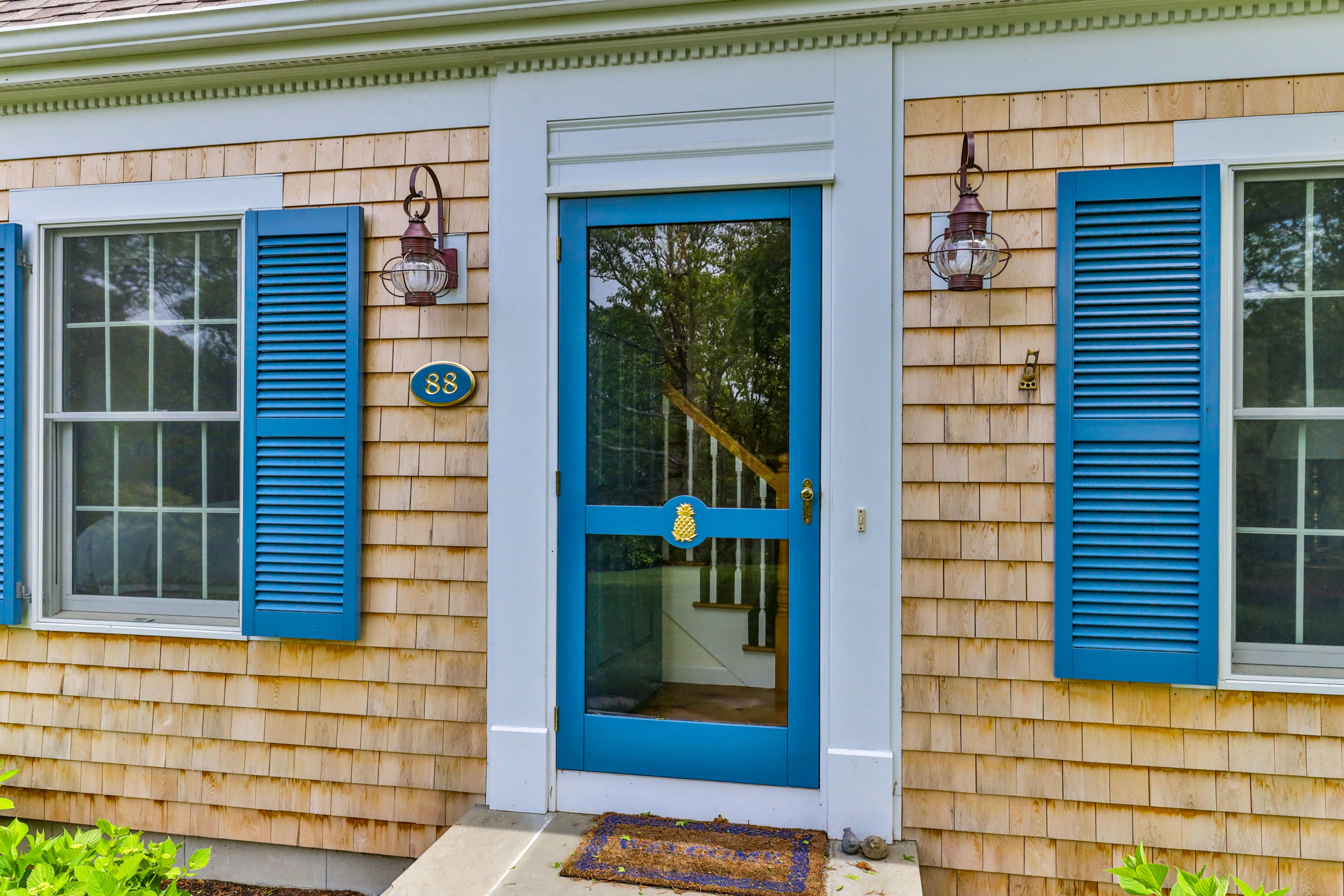 88 Round Cove Road Chatham, MA 02633 - Photo 4 of 58 a view of a door of the house with a window