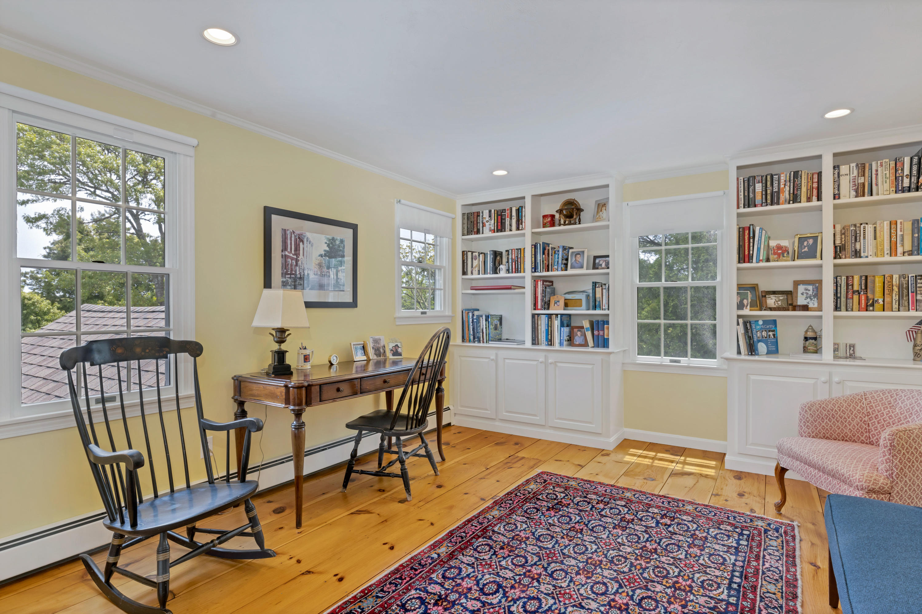 88 Round Cove Road Chatham, MA 02633 - Photo 45 of 58 a view of a livingroom with furniture and a bookshelf