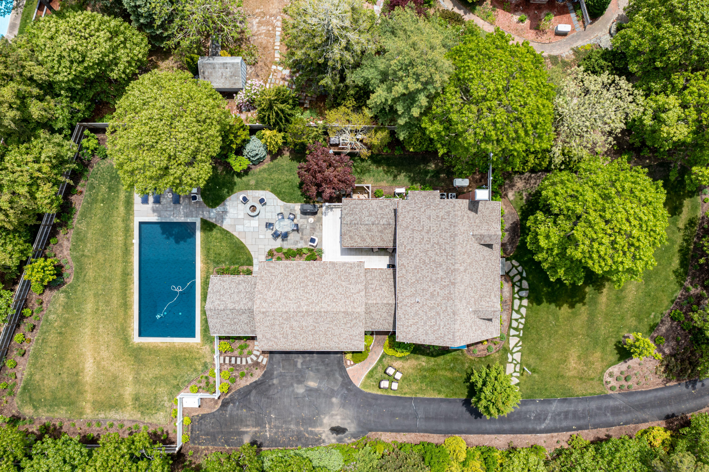88 Round Cove Road Chatham, MA 02633 - Photo 53 of 58 an aerial view of a house with swimming pool