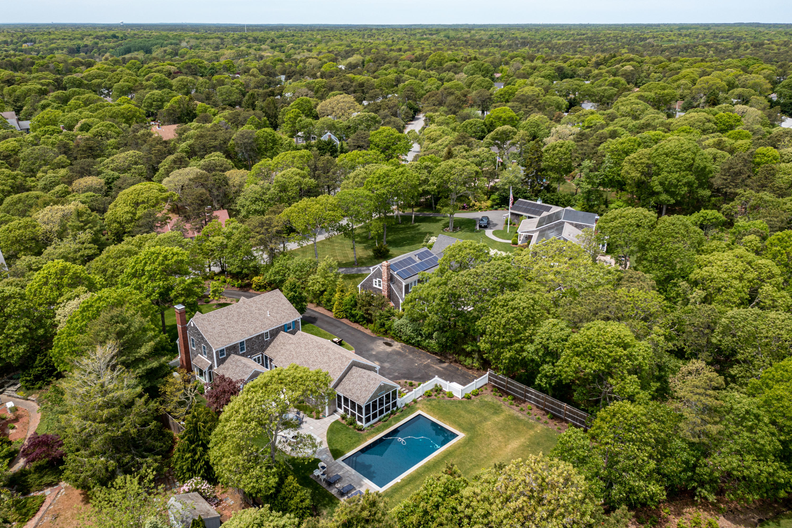 88 Round Cove Road Chatham, MA 02633 - Photo 54 of 58 an aerial view of a house with a yard