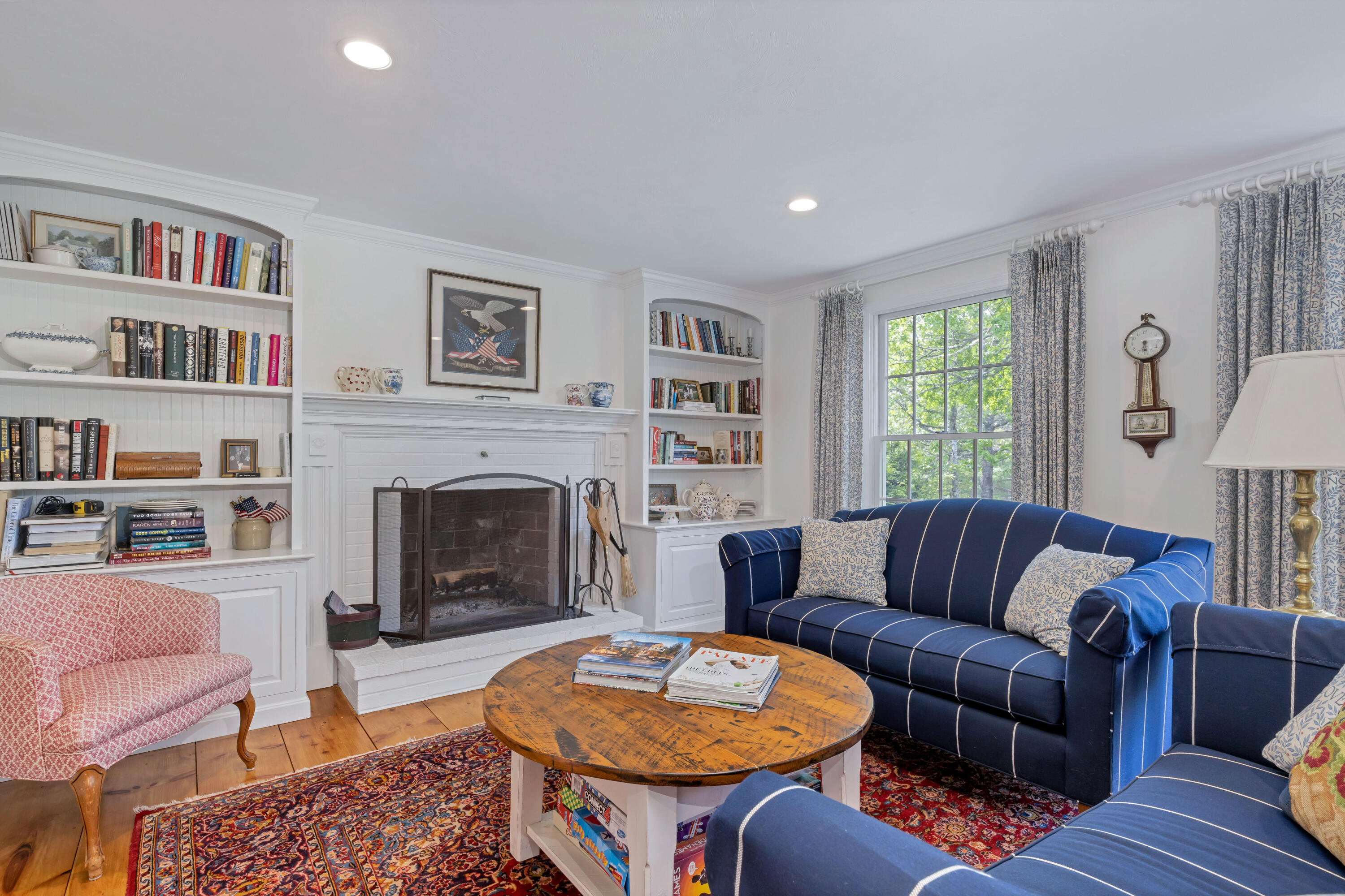 88 Round Cove Road Chatham, MA 02633 - Photo 6 of 58 a living room with furniture fireplace and rug