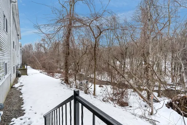 a view of a backyard of the house
