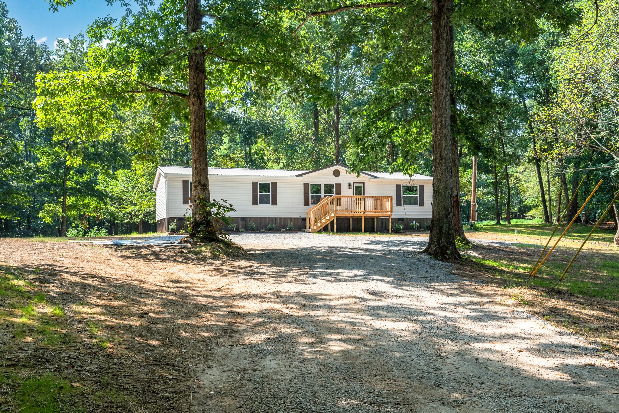 9064 New Chapel Road Springfield, TN 37172 - Photo 1 of 33 a view of a house with a yard and tree s