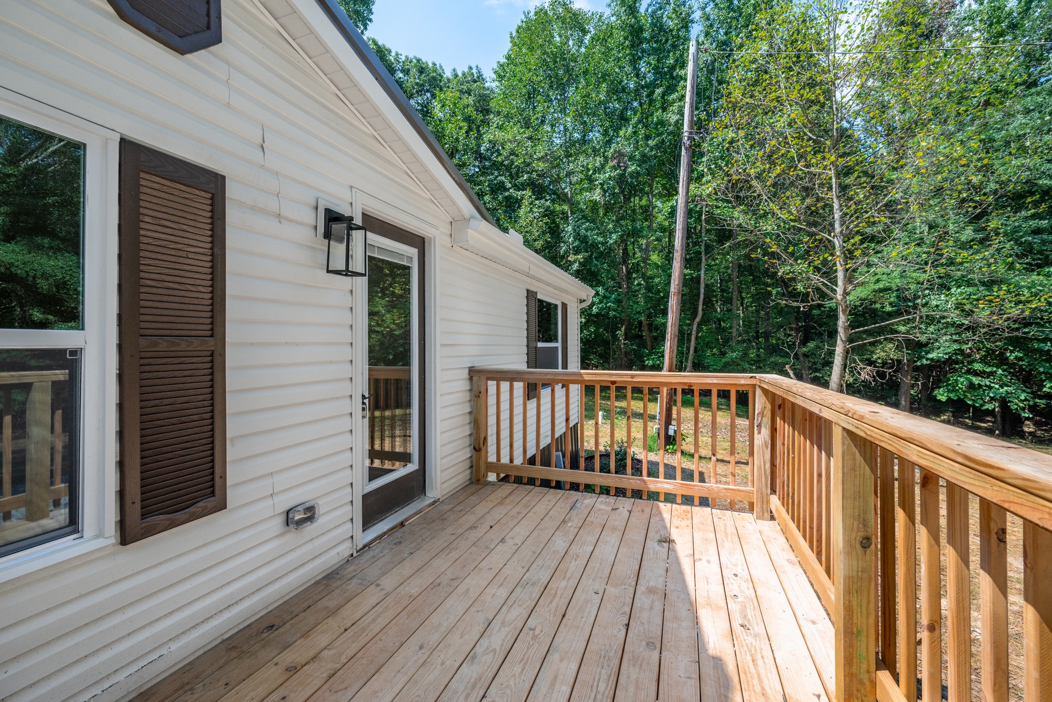 9064 New Chapel Road Springfield, TN 37172 - Photo 24 of 33 a view of balcony with wooden floor and fence