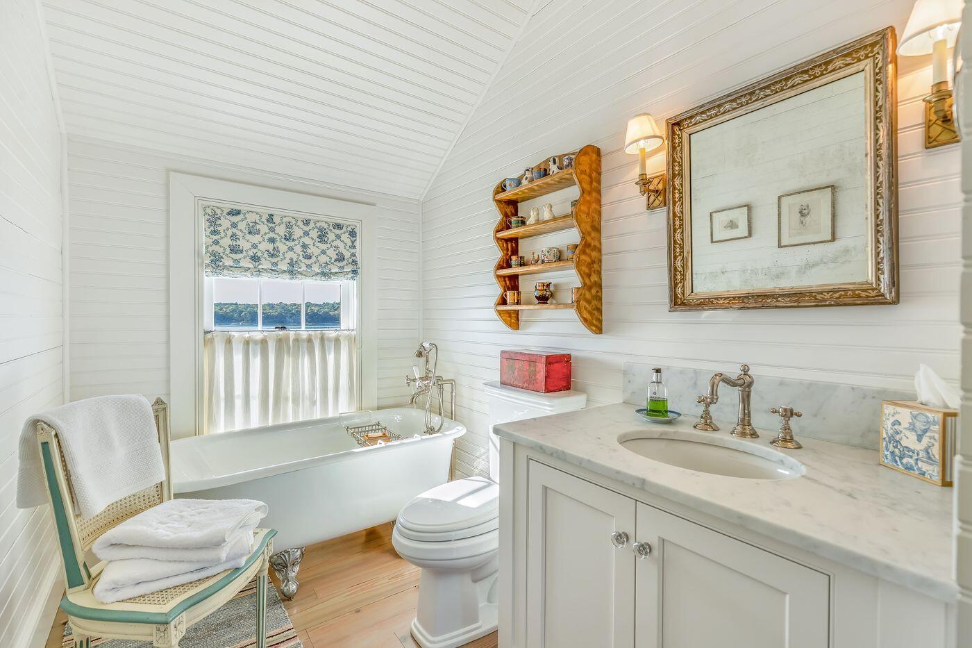 75 Winsor Road Cataumet, MA 02534 - Photo 17 of 27 a bathroom with a granite countertop sink mirror vanity and a toilet