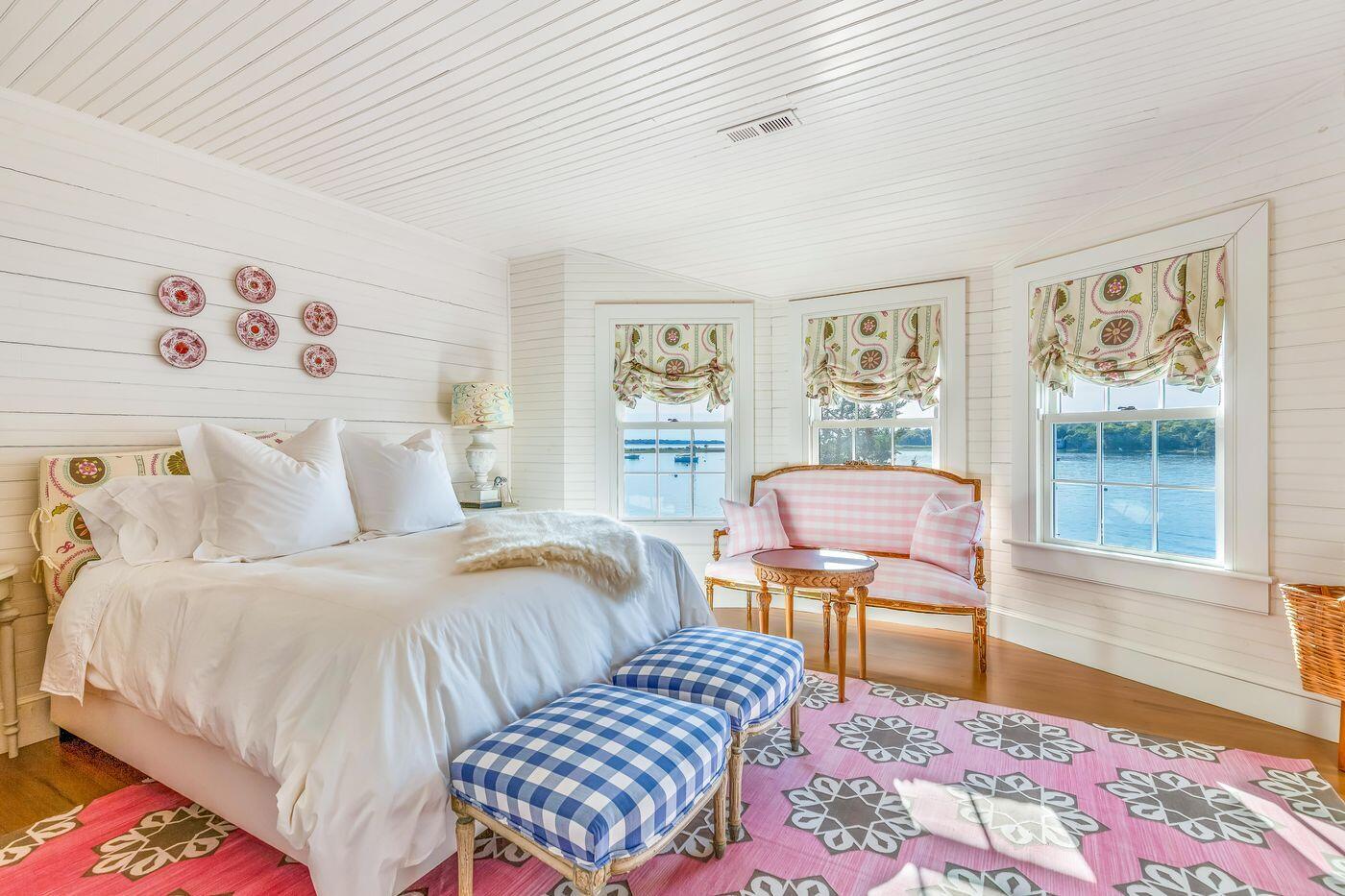 75 Winsor Road Cataumet, MA 02534 - Photo 20 of 27 a bedroom with a bed and wooden floor