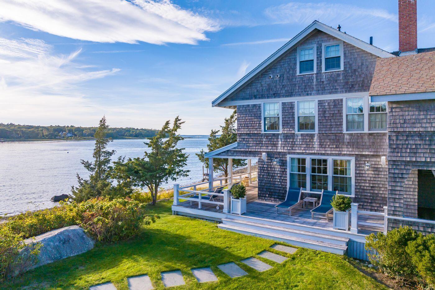 75 Winsor Road Cataumet, MA 02534 - Photo 22 of 27 a view of a house with swimming pool next to a yard