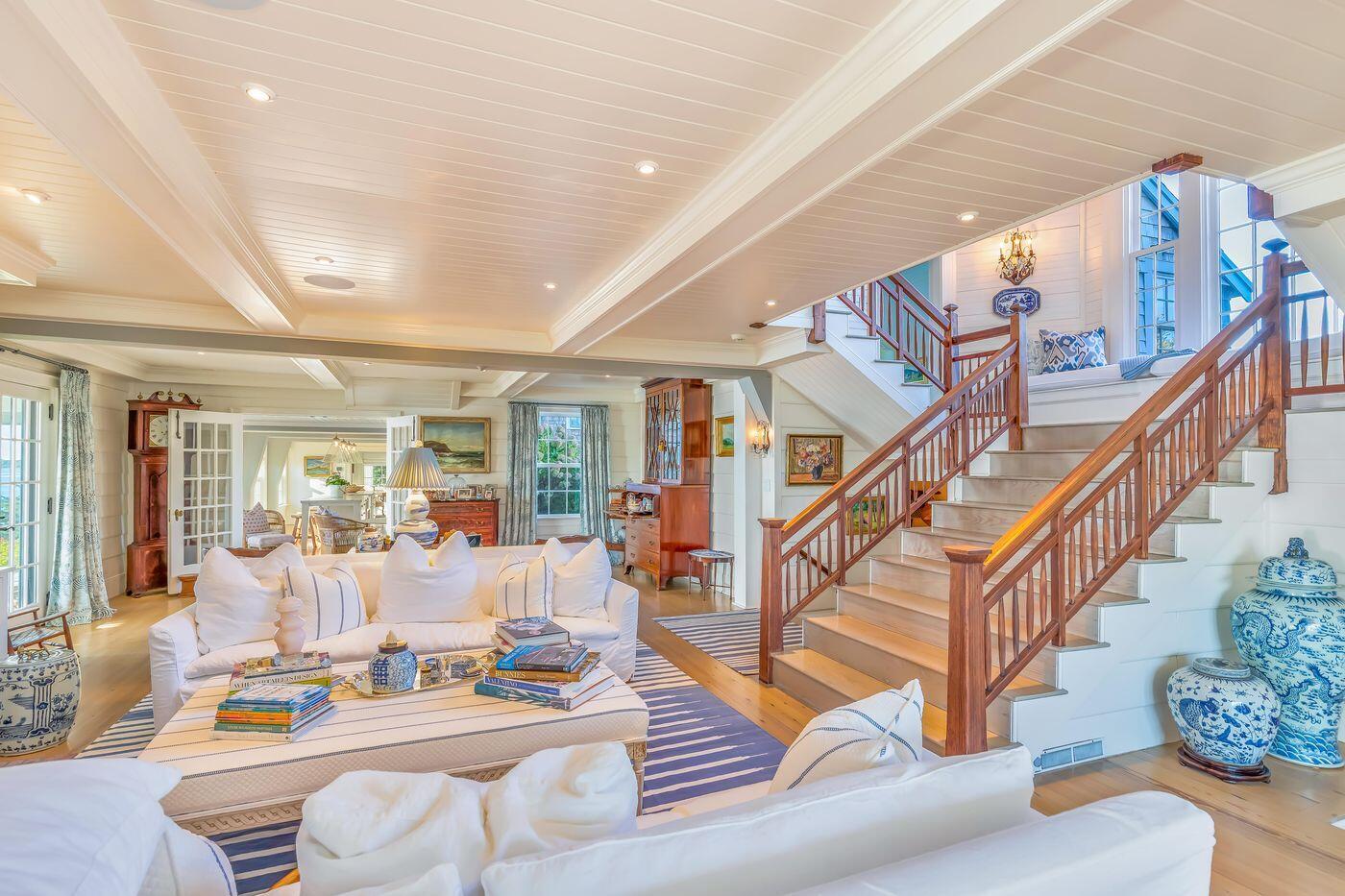 75 Winsor Road Cataumet, MA 02534 - Photo 7 of 27 a living room with furniture and stairs