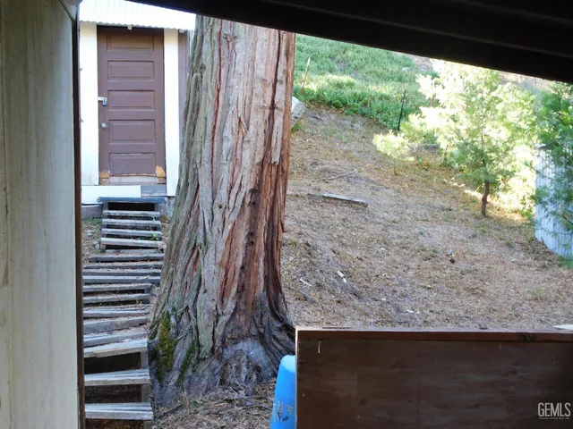 a view of a wooden floor and a window