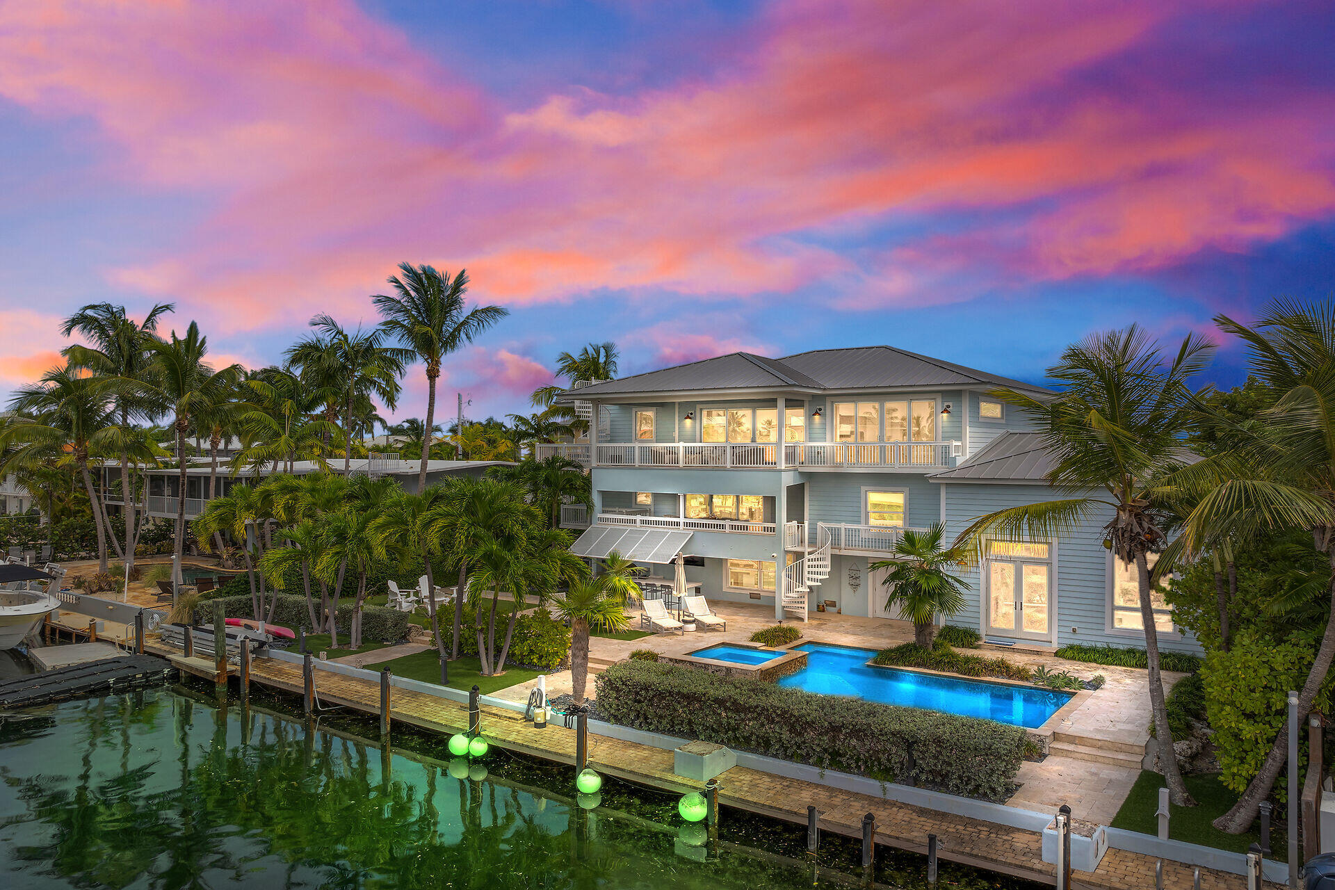 133 Severino Drive Islamorada, FL 33036 - Photo 1 of 27 a view of a house with swimming pool and sitting area