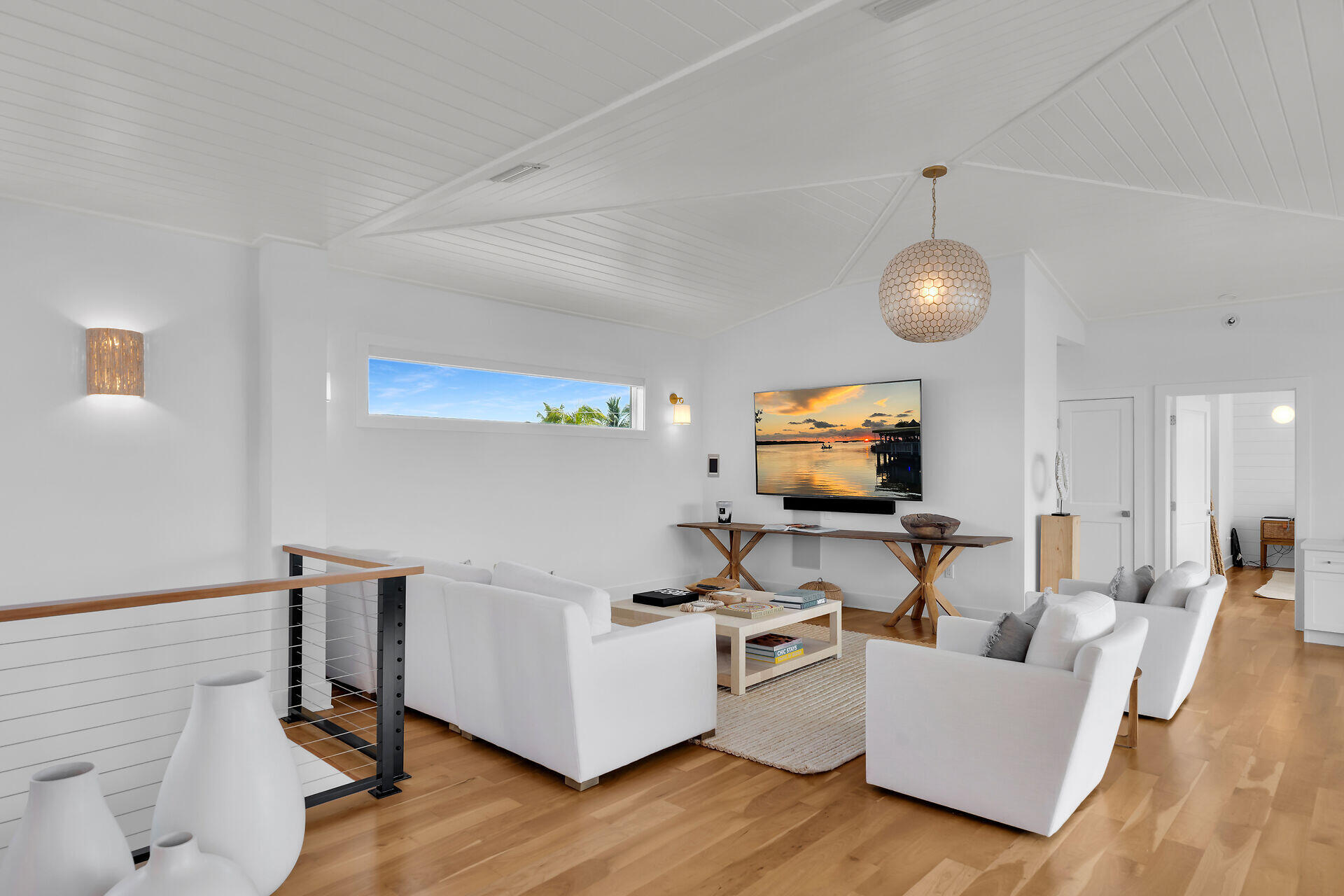 133 Severino Drive Islamorada, FL 33036 - Photo 11 of 27 a living room with furniture and a flat screen tv