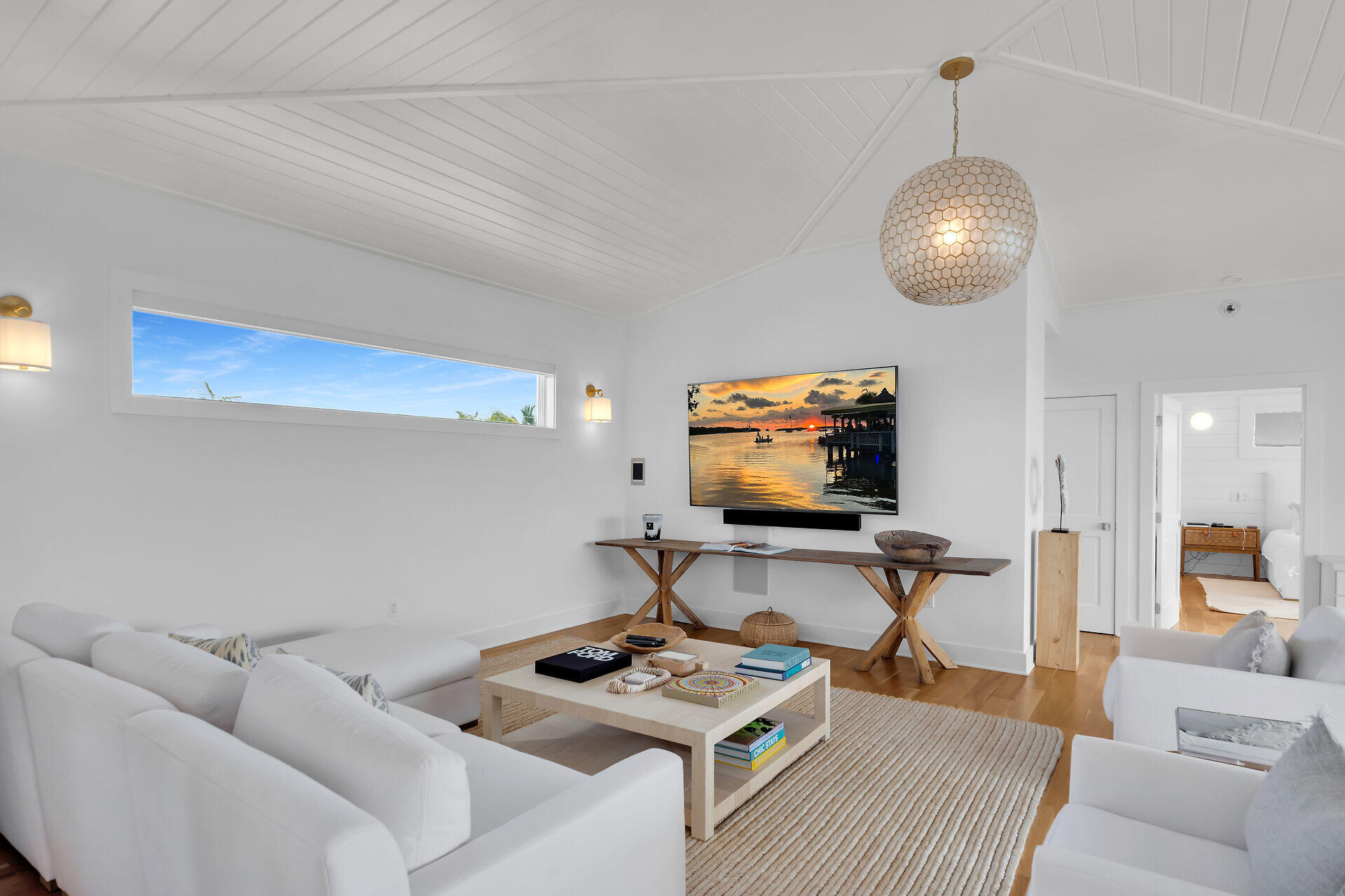133 Severino Drive Islamorada, FL 33036 - Photo 12 of 27 a living room with furniture and a flat screen tv