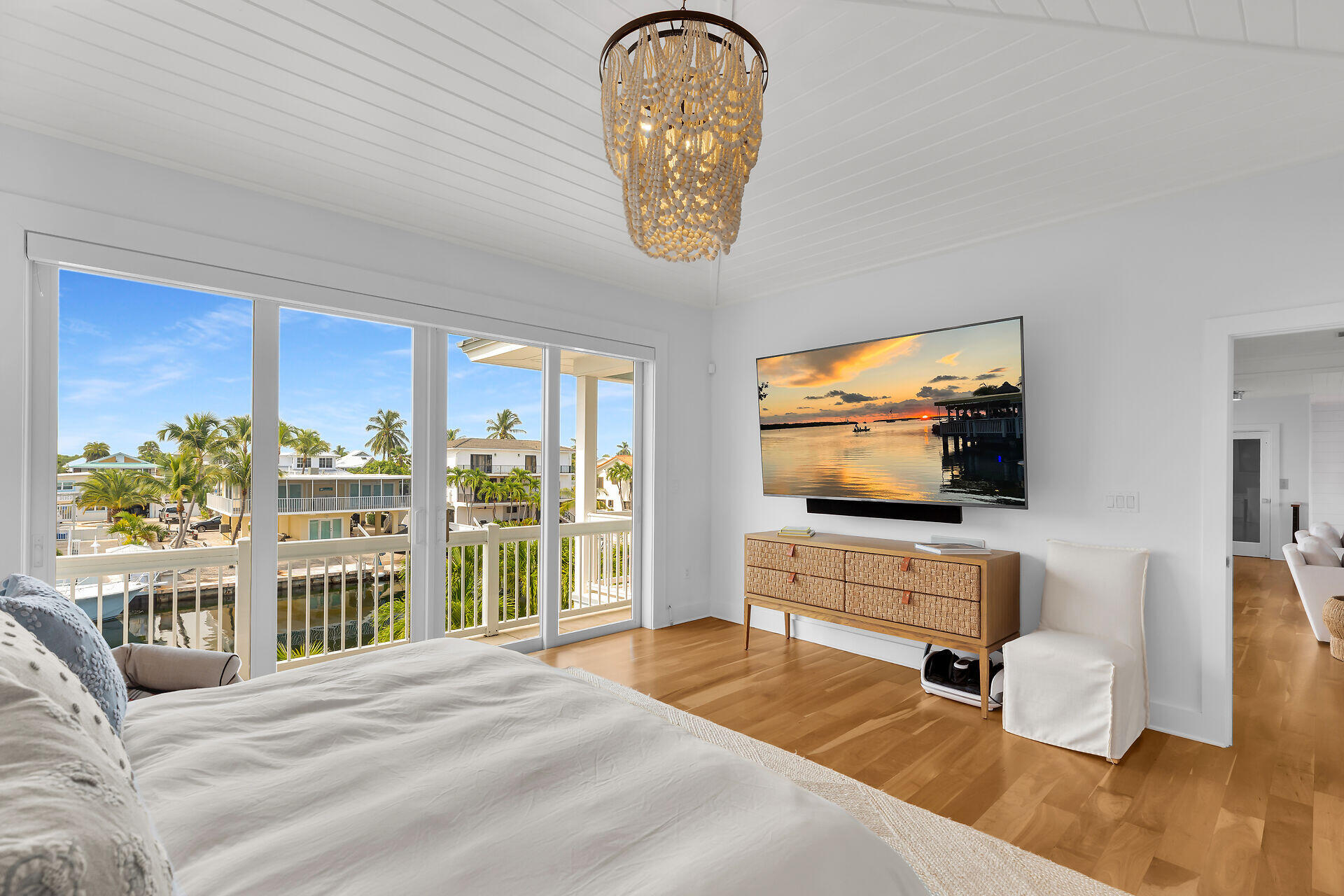 133 Severino Drive Islamorada, FL 33036 - Photo 15 of 27 a bedroom with furniture and a flat screen tv