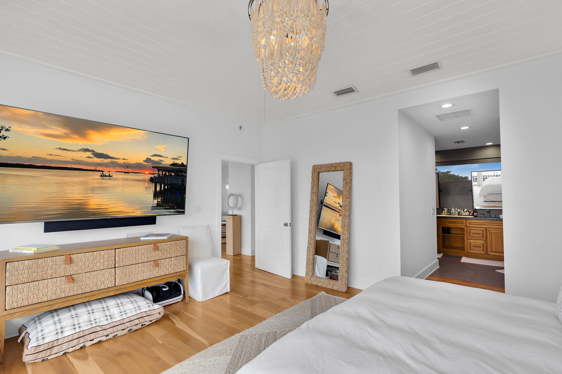 133 Severino Drive Islamorada, FL 33036 - Photo 17 of 27 a bedroom with furniture and a flat screen tv