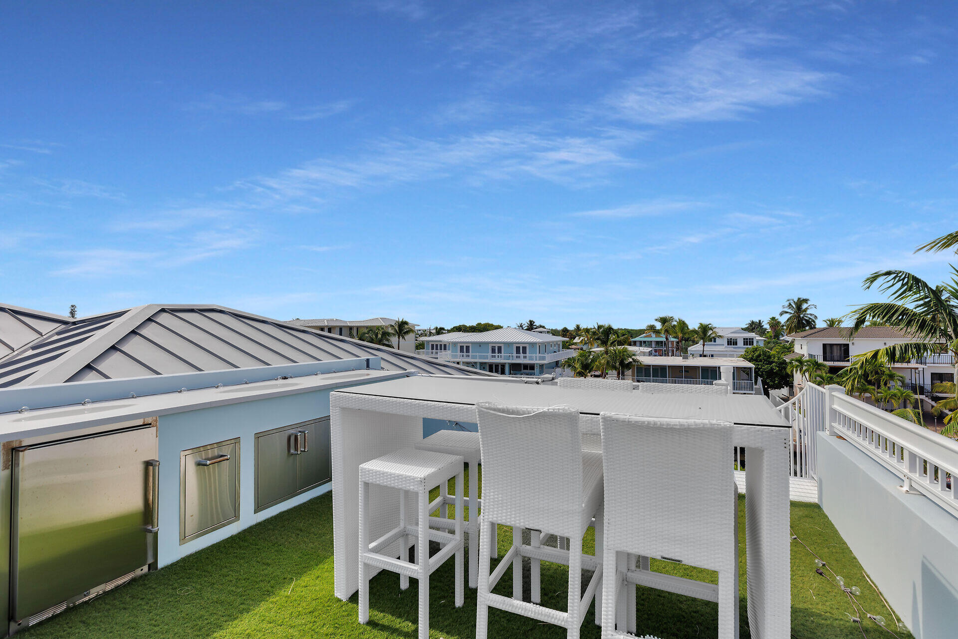 133 Severino Drive Islamorada, FL 33036 - Photo 22 of 27 a view of a patio with table and chairs and potted plants