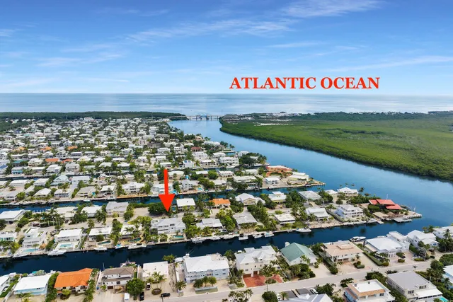 a view of a water fountain and an outdoor seating