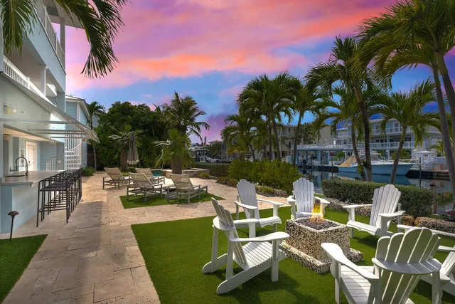 a view of a patio with swimming pool