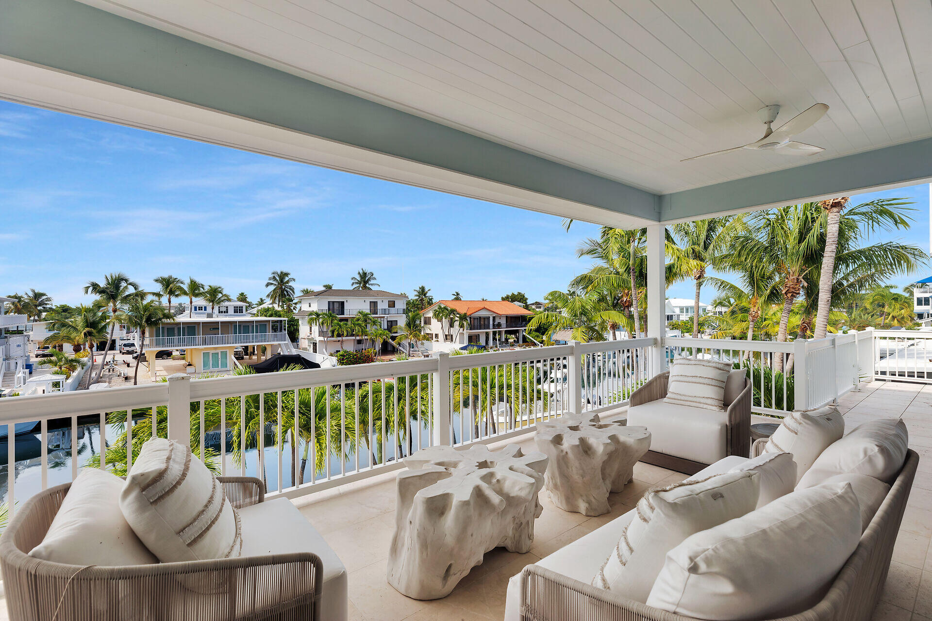 133 Severino Drive Islamorada, FL 33036 - Photo 9 of 27 a balcony with furniture and a potted plant