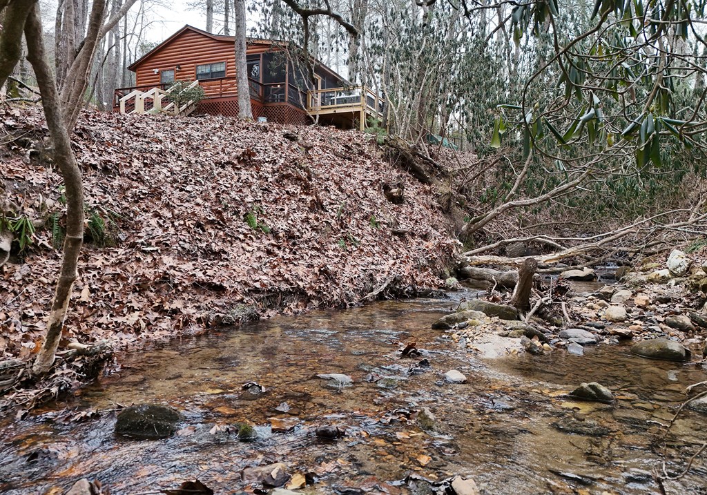 266 Mabry Lane Morganton, GA 30560 - Photo 18 of 37 a front view of a house with a yard