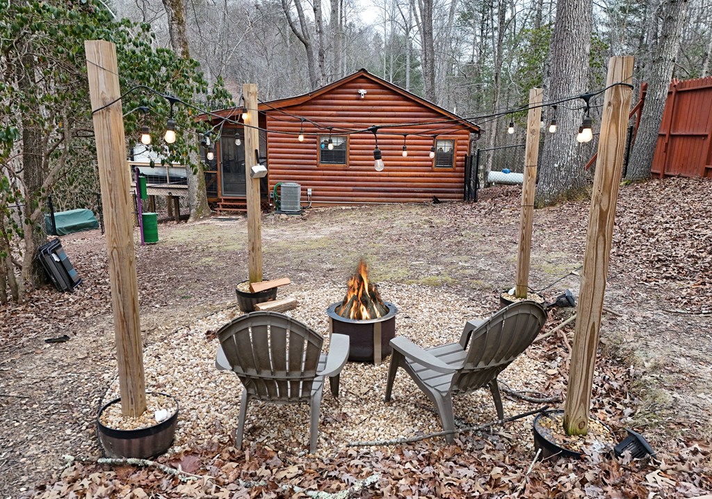 266 Mabry Lane Morganton, GA 30560 - Photo 2 of 37 a view of a chairs and tables in the patio