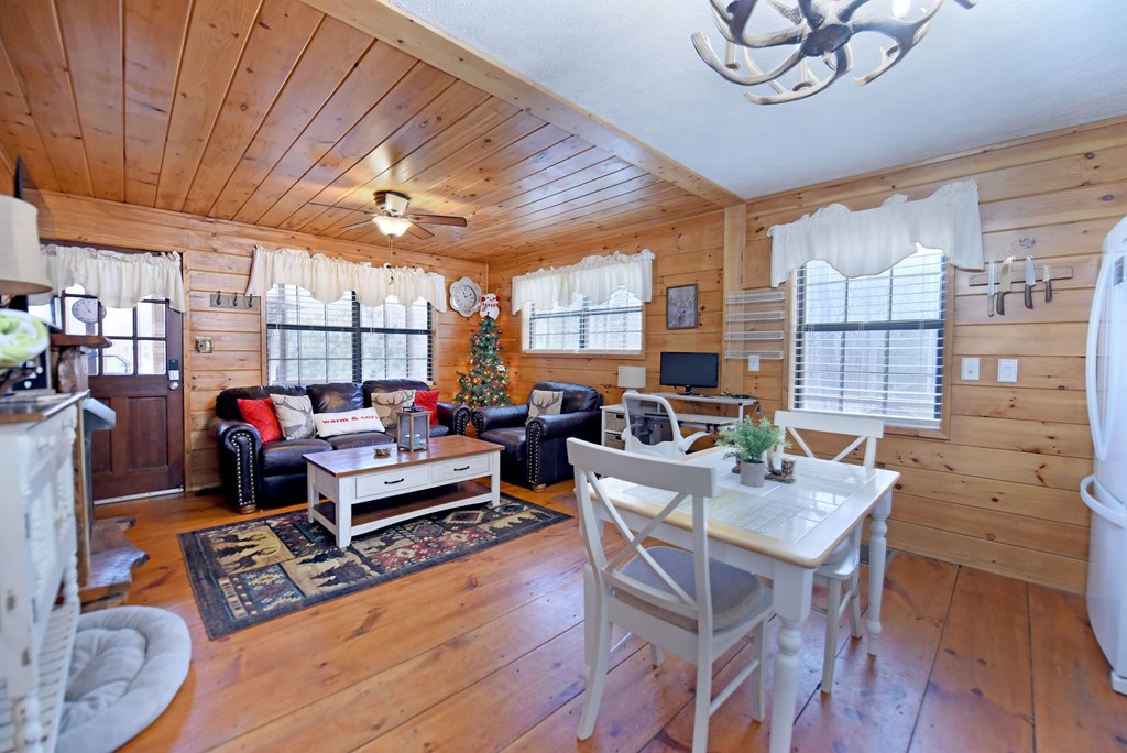 266 Mabry Lane Morganton, GA 30560 - Photo 31 of 37 a living room with furniture and a large window
