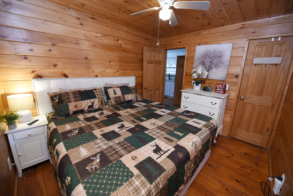 266 Mabry Lane Morganton, GA 30560 - Photo 35 of 37 a bed sitting in a room next to a window