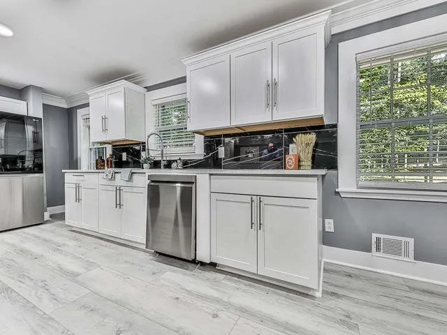 $699,990 | 1564 Bubbling Creek Road Northeast, Brookhaven, GA 30319