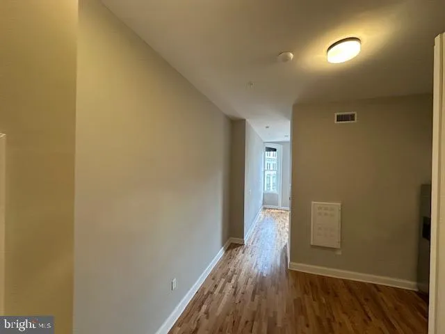 a bathroom with a sink a toilet and vanity