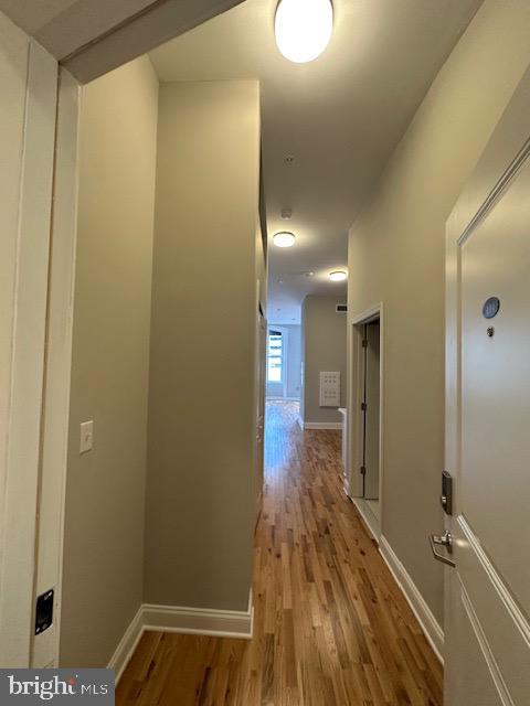100 West Lexington Street, Unit 305 Baltimore, MD 21201 - Photo 35 of 38 a view of a hallway with wooden floor
