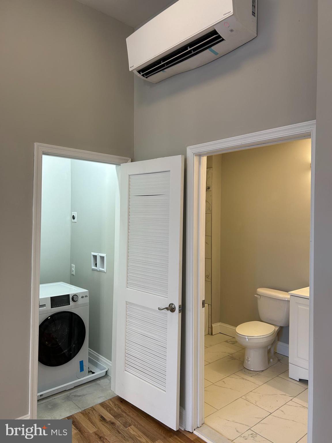 100 West Lexington Street, Unit 305 Baltimore, MD 21201 - Photo 7 of 38 a bathroom with a toilet and a sink