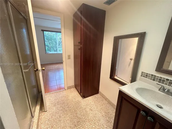 a view of a room with racks on the wall