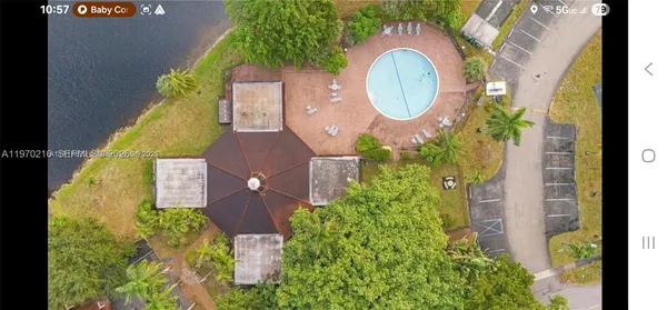 a view of a lake with a building in the background