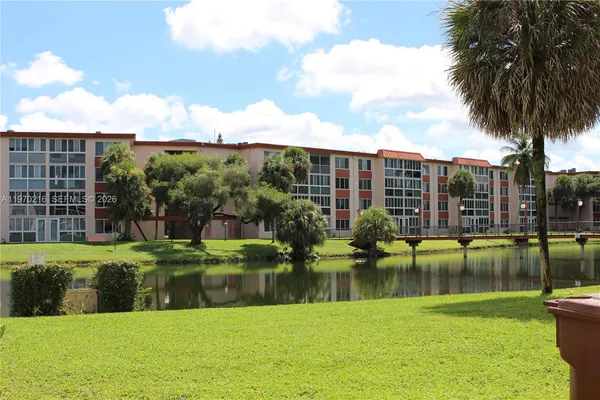 a view of a lake with a big yard