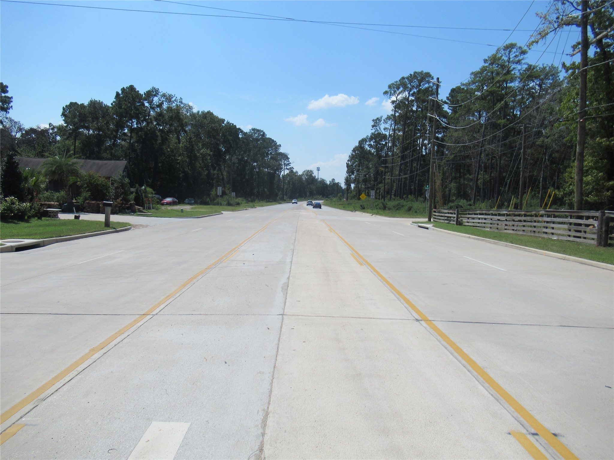 24685 Sorters Road Porter, TX 77365 - Photo 6 of 6 a view of a tennis court