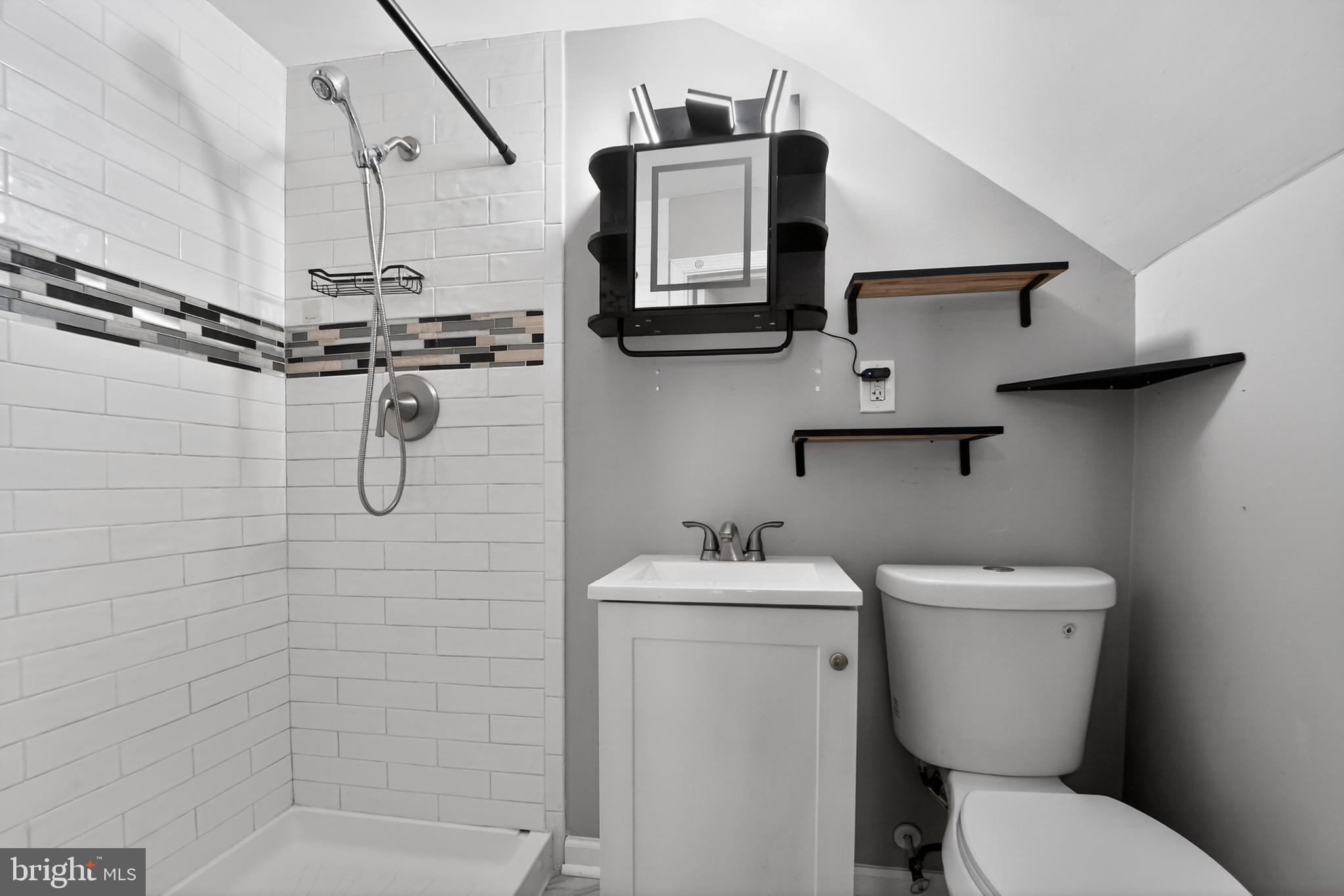 8103 Cornwall Road Dundalk, MD 21222 - Photo 15 of 18 Sleek modern bathroom with stylish accents.