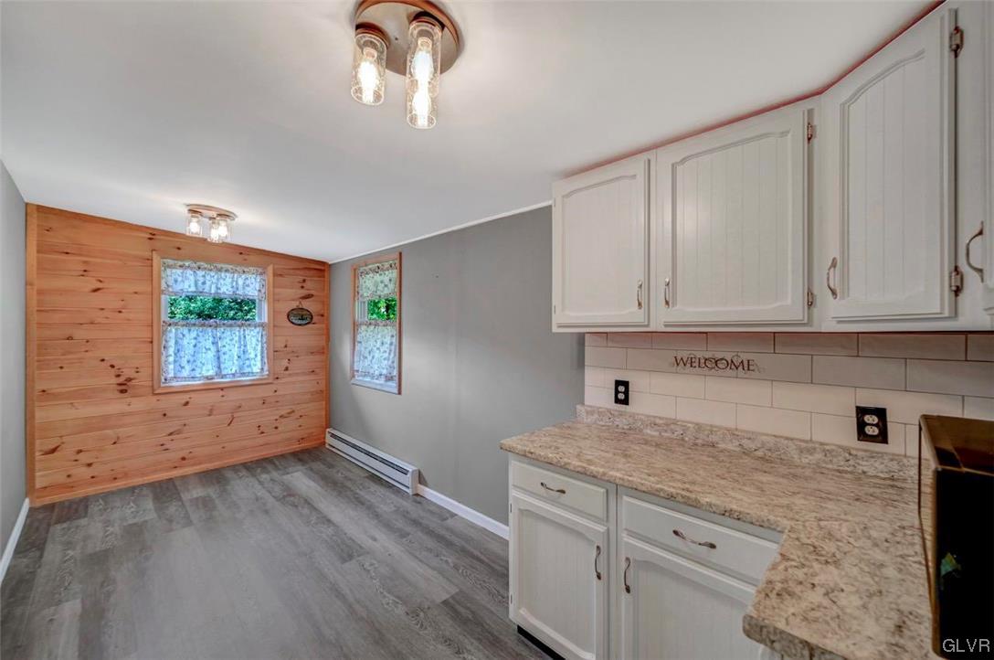 118 Shortridge Road Albrightsville, PA 18210 - Photo 16 of 28 The Dining Room has laminate flooring, a wood tong
