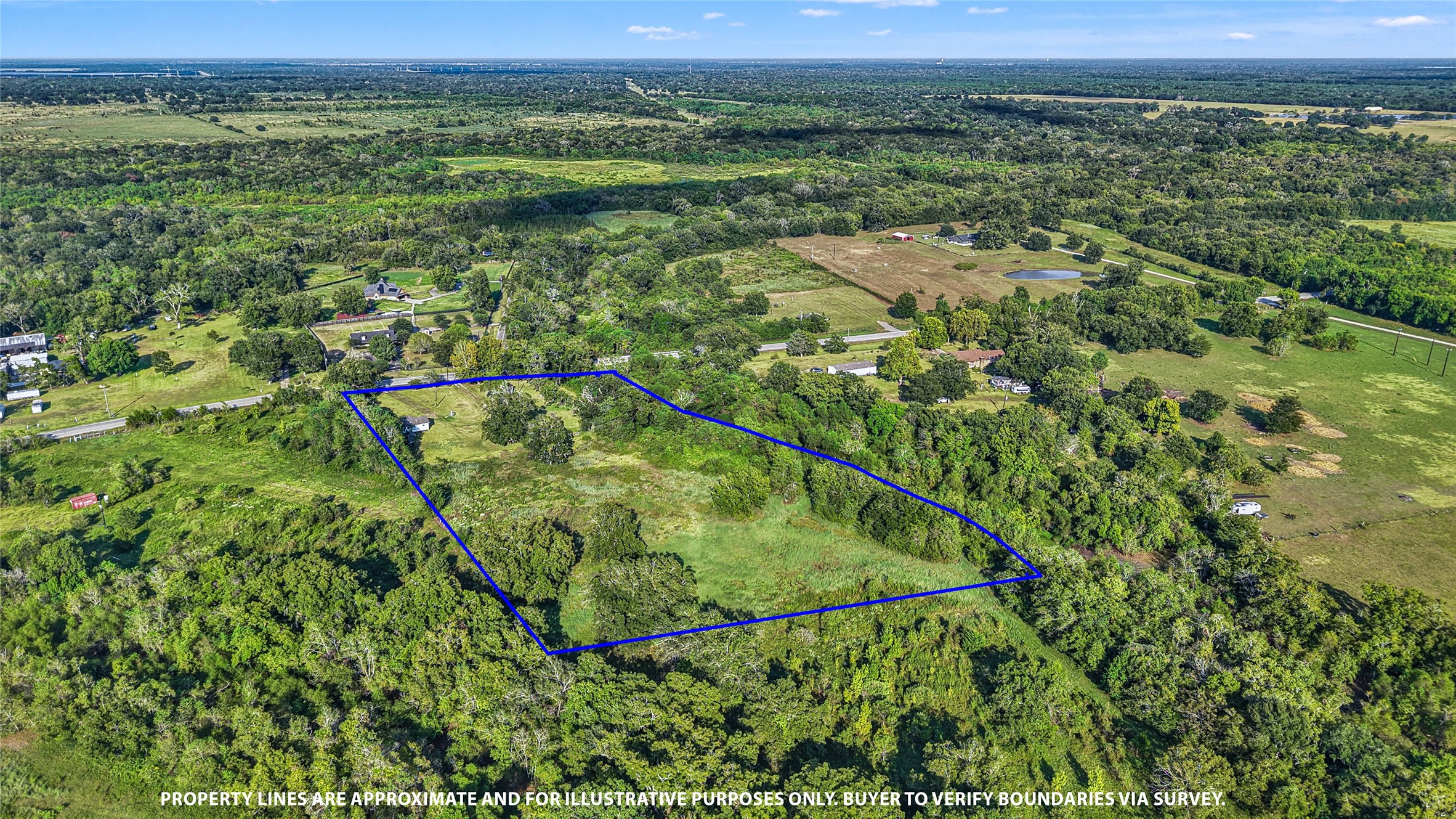 3014 Farm To Market 524 Road Sweeny, TX 77480 - Photo 4 of 18 The property borders Dance Bayou, where water levels can vary throughout the year, and offers privacy with no neighboring homes visible on either side or behind.