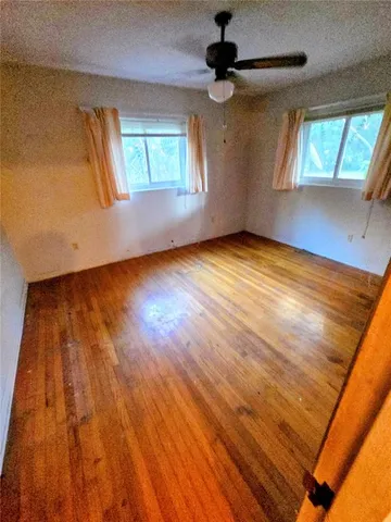 an empty room with windows