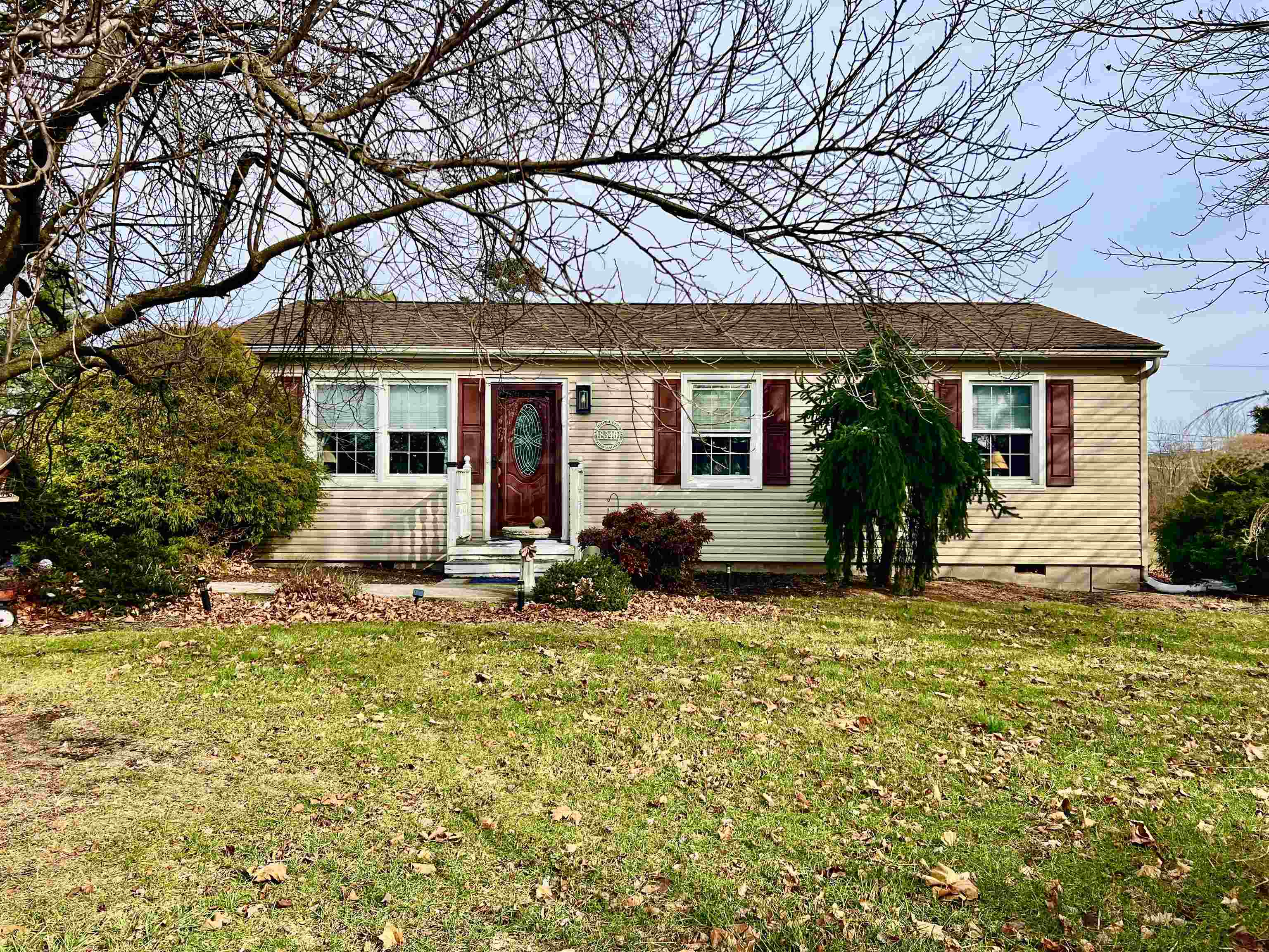 front view of a house with a yard