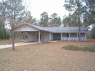 5822 Old Bethel Road Crestview, FL 32536 - Photo 1 of 1 front view of a house with a yard