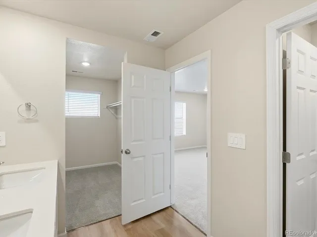 a view of a room with racks on the wall