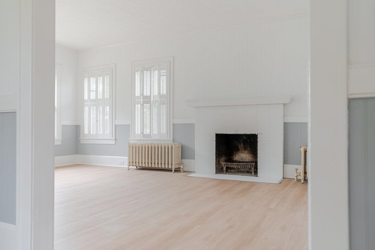 9571 Town Hall Road McGaheysville, VA 22840 - Photo 13 of 66 a view of a livingroom with a fireplace and window