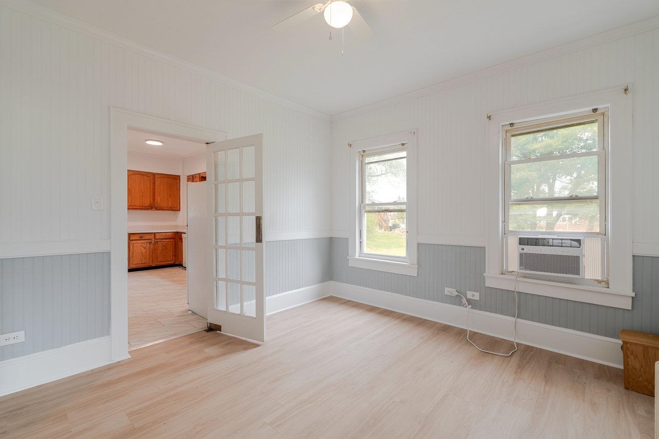 9571 Town Hall Road McGaheysville, VA 22840 - Photo 16 of 66 wooden floor in an empty room with a window