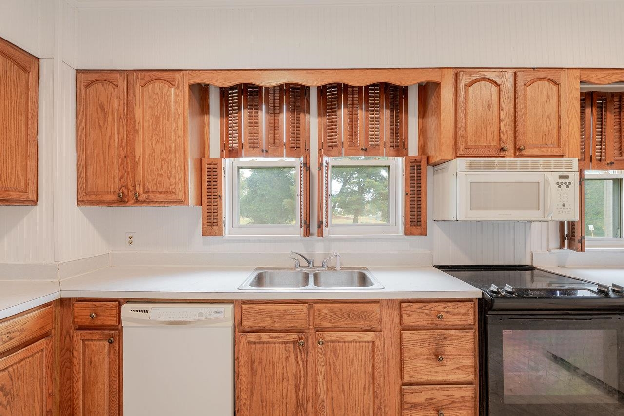 9571 Town Hall Road McGaheysville, VA 22840 - Photo 22 of 66 a kitchen with a sink and a window