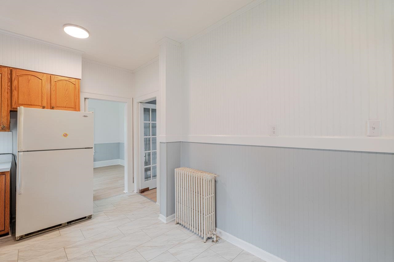 9571 Town Hall Road McGaheysville, VA 22840 - Photo 23 of 66 a view of storage and utility room with refrigerator