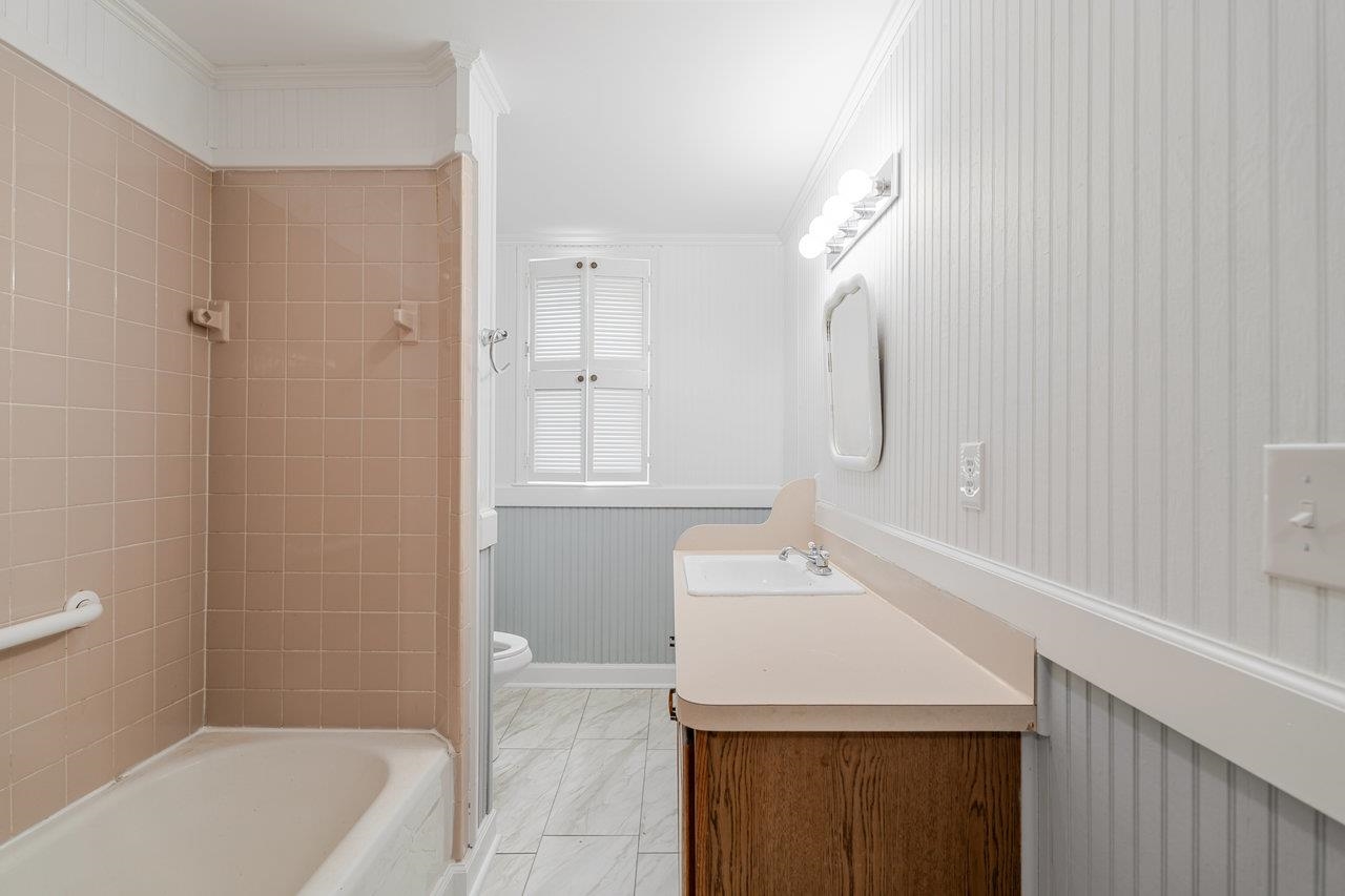 9571 Town Hall Road McGaheysville, VA 22840 - Photo 25 of 66 a bathroom with a sink a toilet and shower